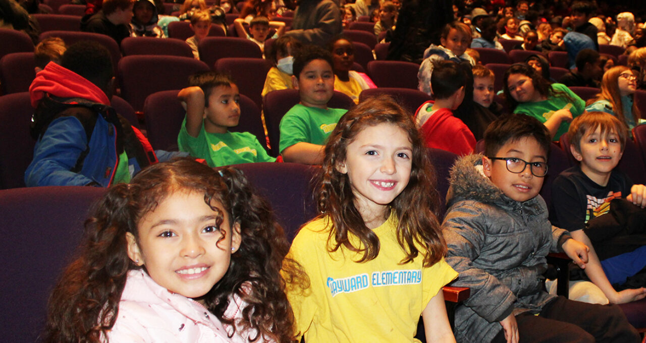 Students wait for "Schoolhouse Rock Live!" to begin.