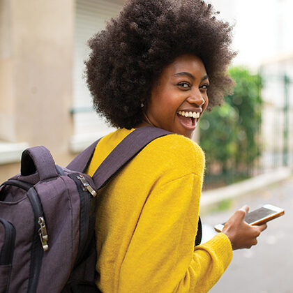 A student walks on campus.