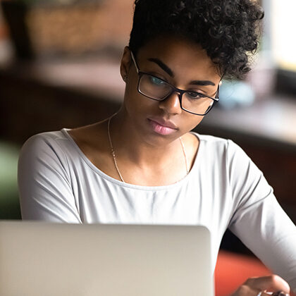 A student works on a laptop