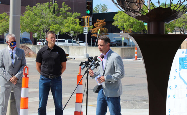 Andy Patterson, president of the Sioux Falls Area Community Foundation, speaks at the news conference announcing the grant from Bloomberg Philanthropies’ Asphalt Art Initiative.