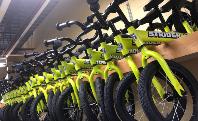 Strider bikes are assembled for students at Eugene Field A+ Elementary